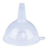 The Zambak Funnel No2 is a transparent plastic funnel with a wide base and narrow spout, ideal for transferring liquids or powders into containers with small openings. Pack contains 1 piece.